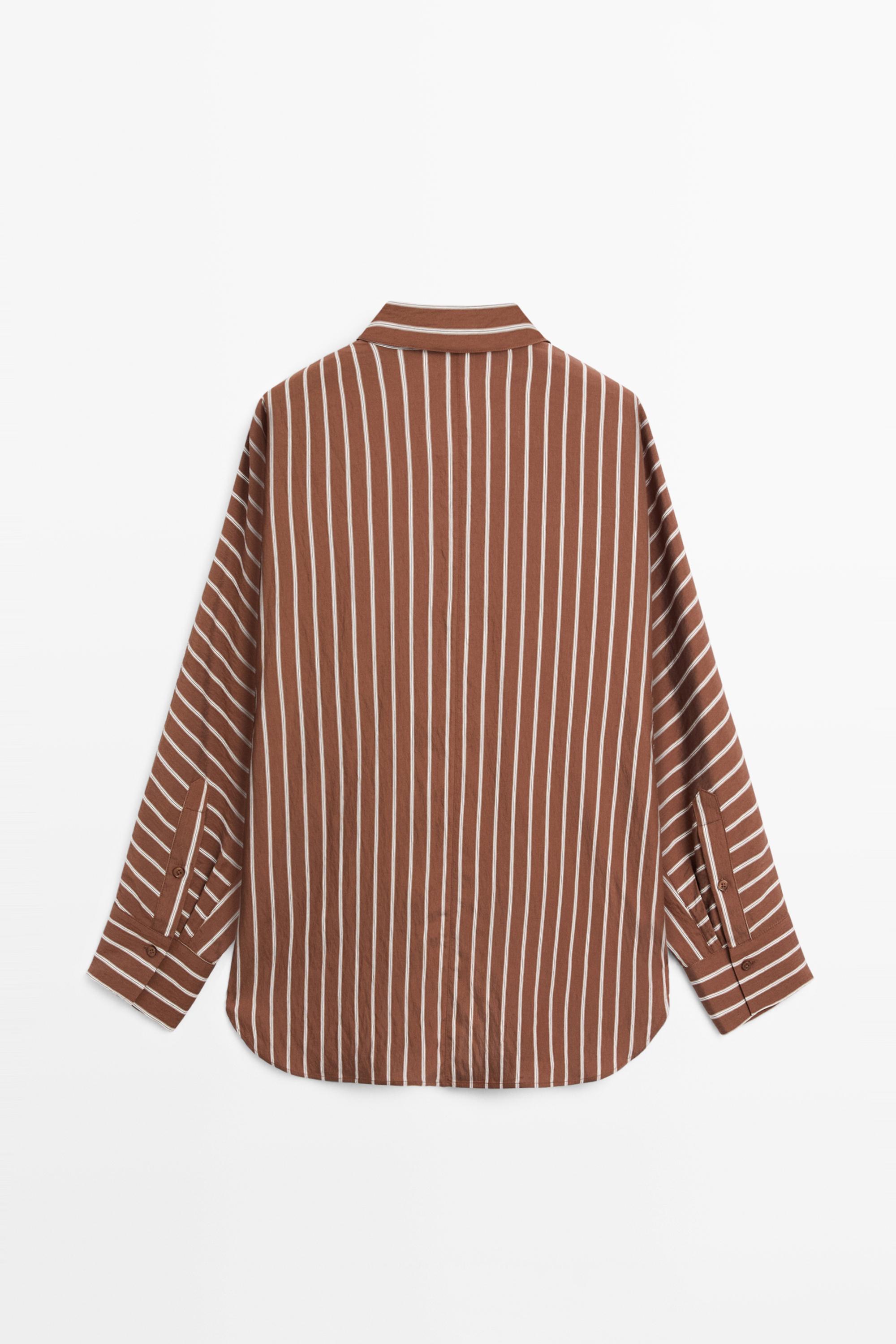 Flowing striped shirt with batwing sleeves